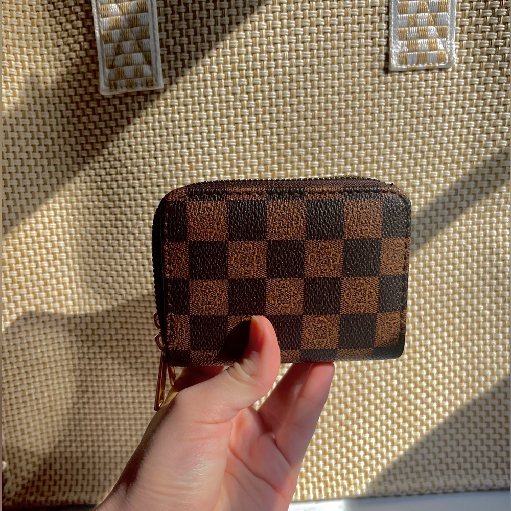 Brown checkered zip wallet